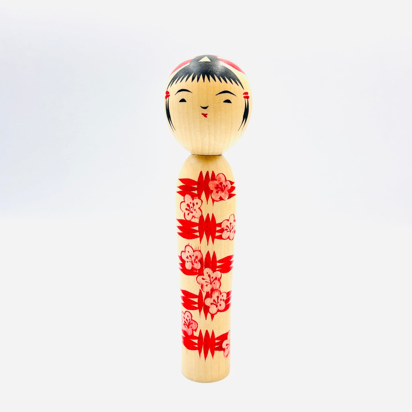 Kokeshi Naruko Stil, Kube-ire/Igeta mit Pflaume