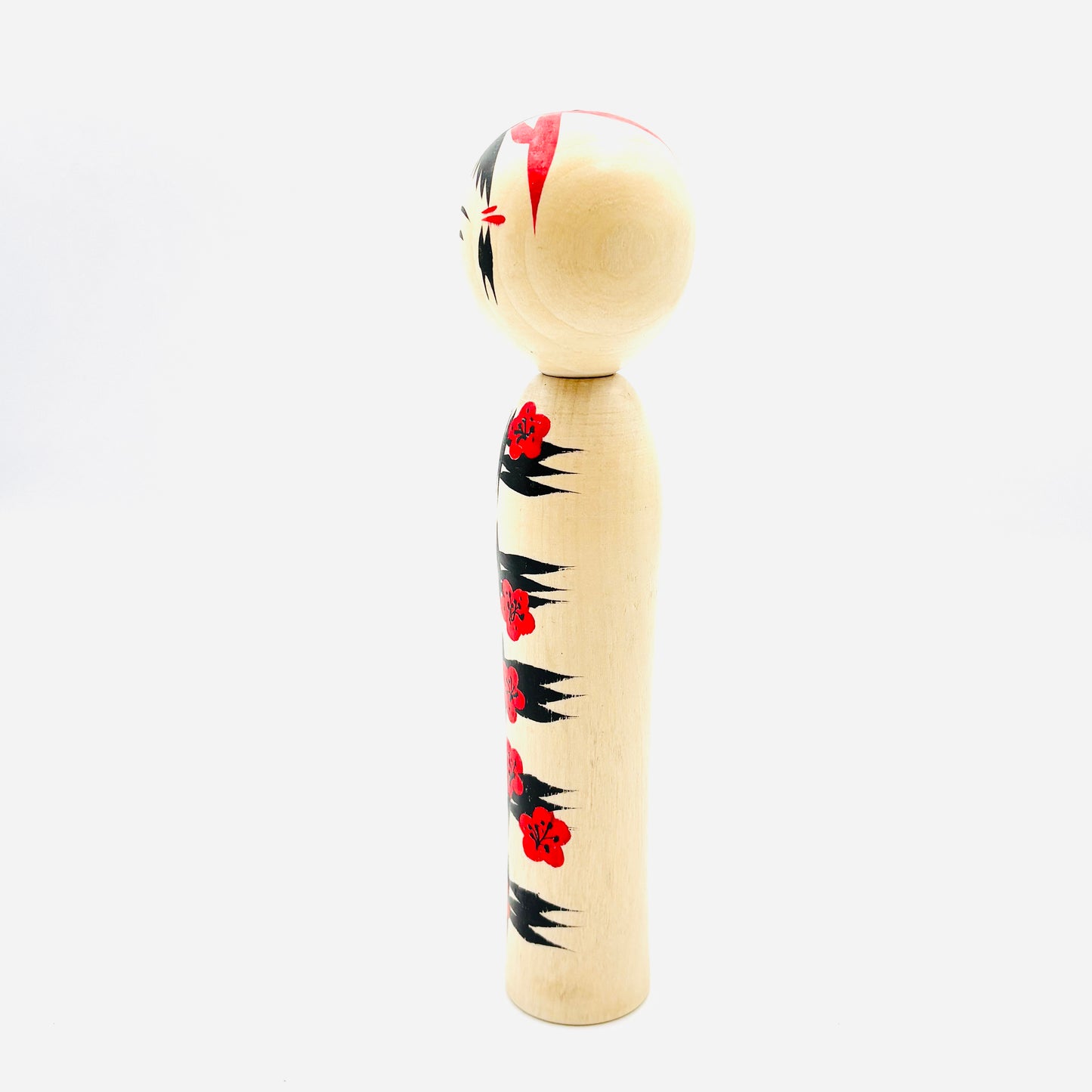 Kokeshi Naruko Stil, Kube-ire/Igeta mit Pflaume