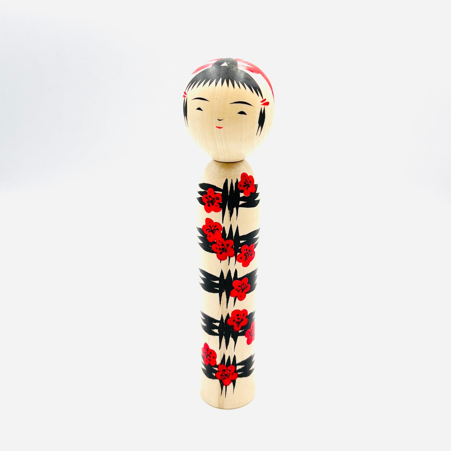 Kokeshi Naruko Stil, Kube-ire/Igeta mit Pflaume